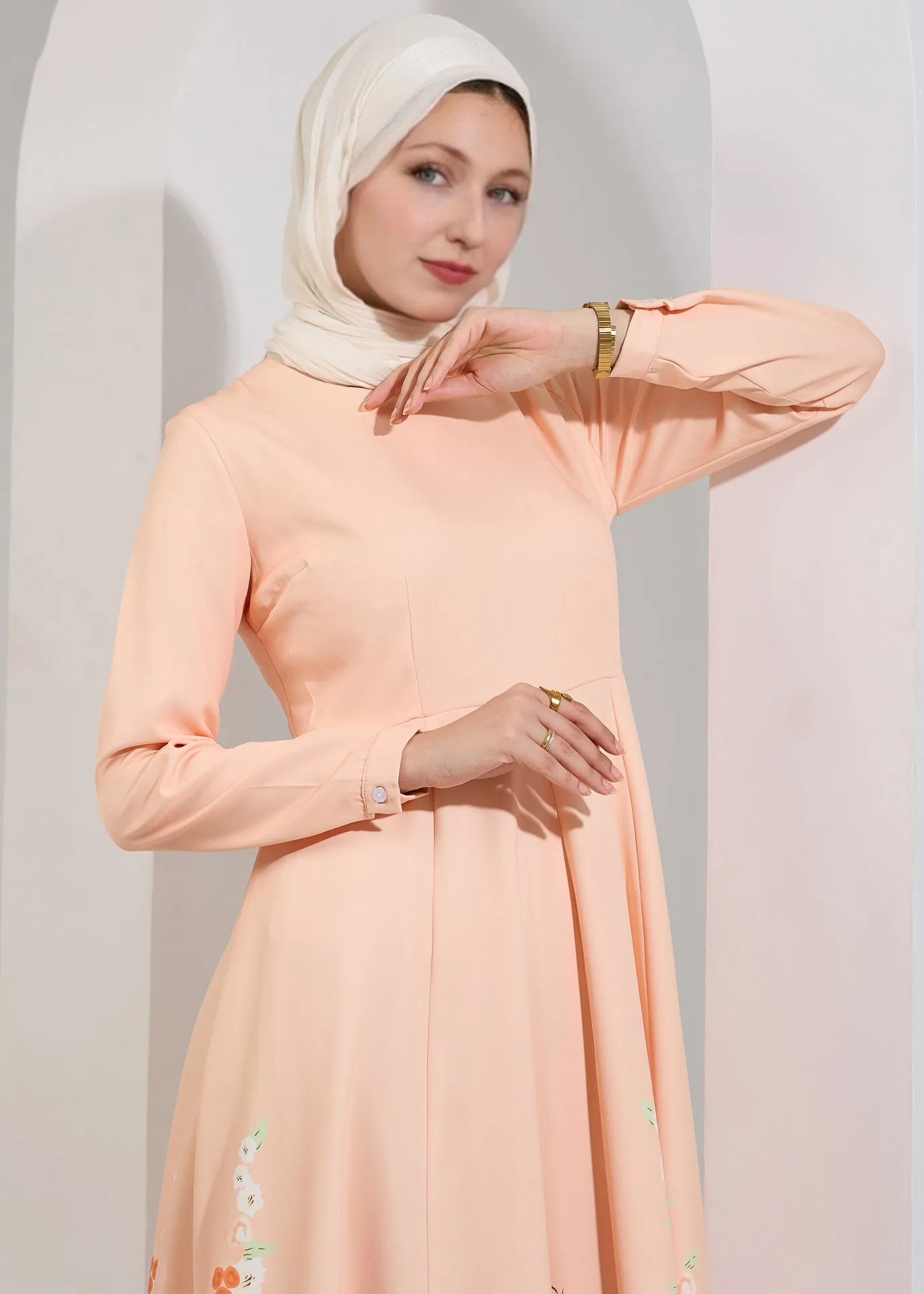 Rania Ethereal Bloom Modest Maxi Dress in Pastel Peach with Floral Hem
