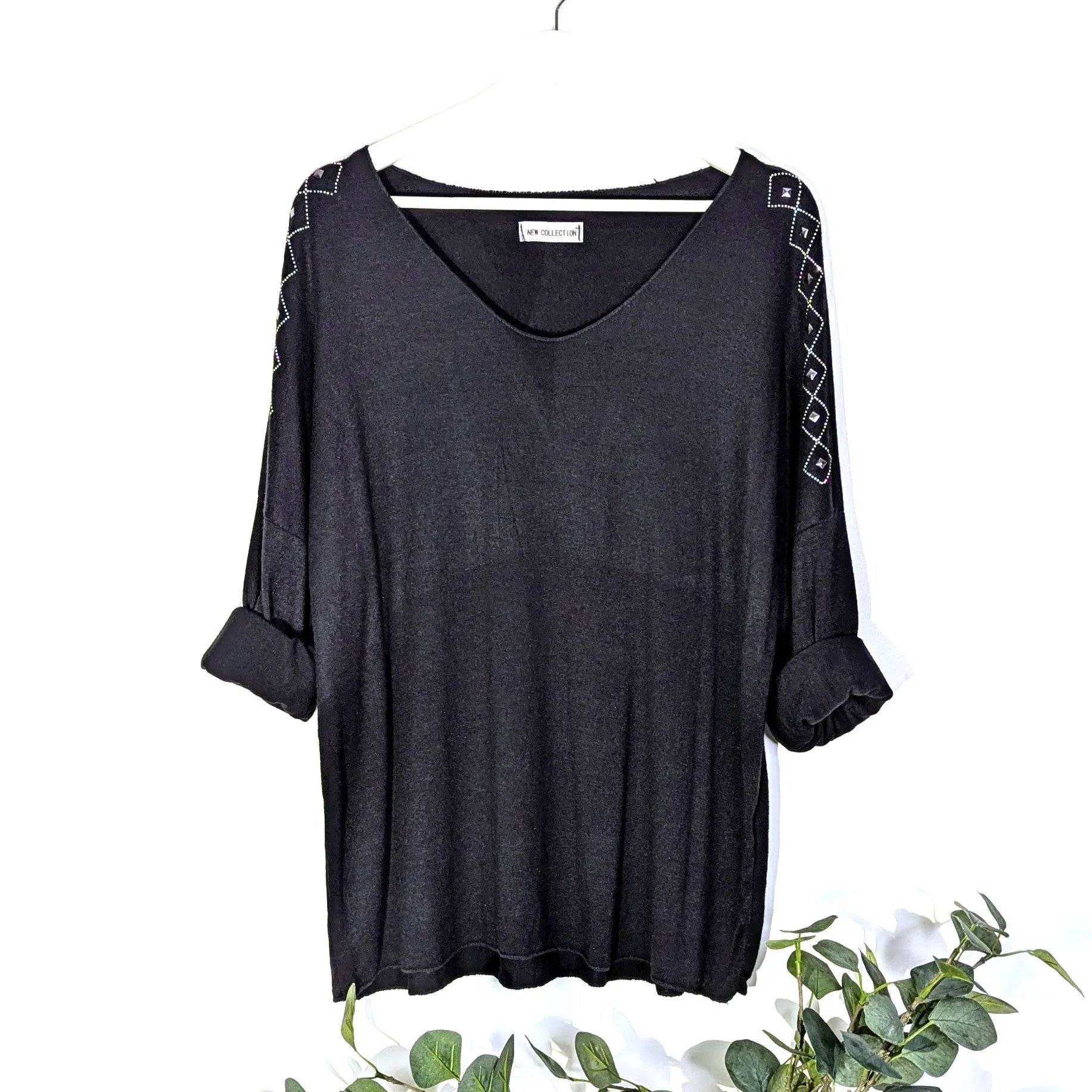 Soft fine knit cosy V-neck top with crystal diamond detail on the shoulder